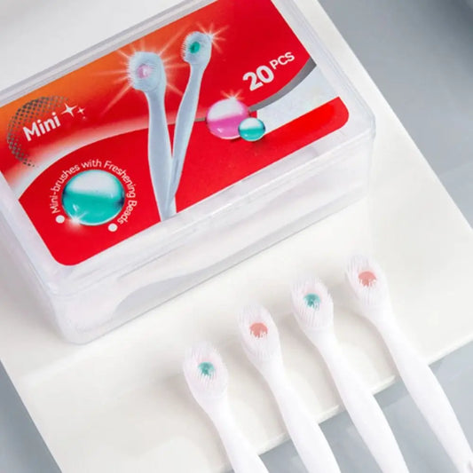 Mini Travel Toothbrush with Freshening Bead